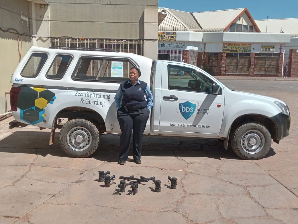 Do Dot Security vehicle wide shot with officer