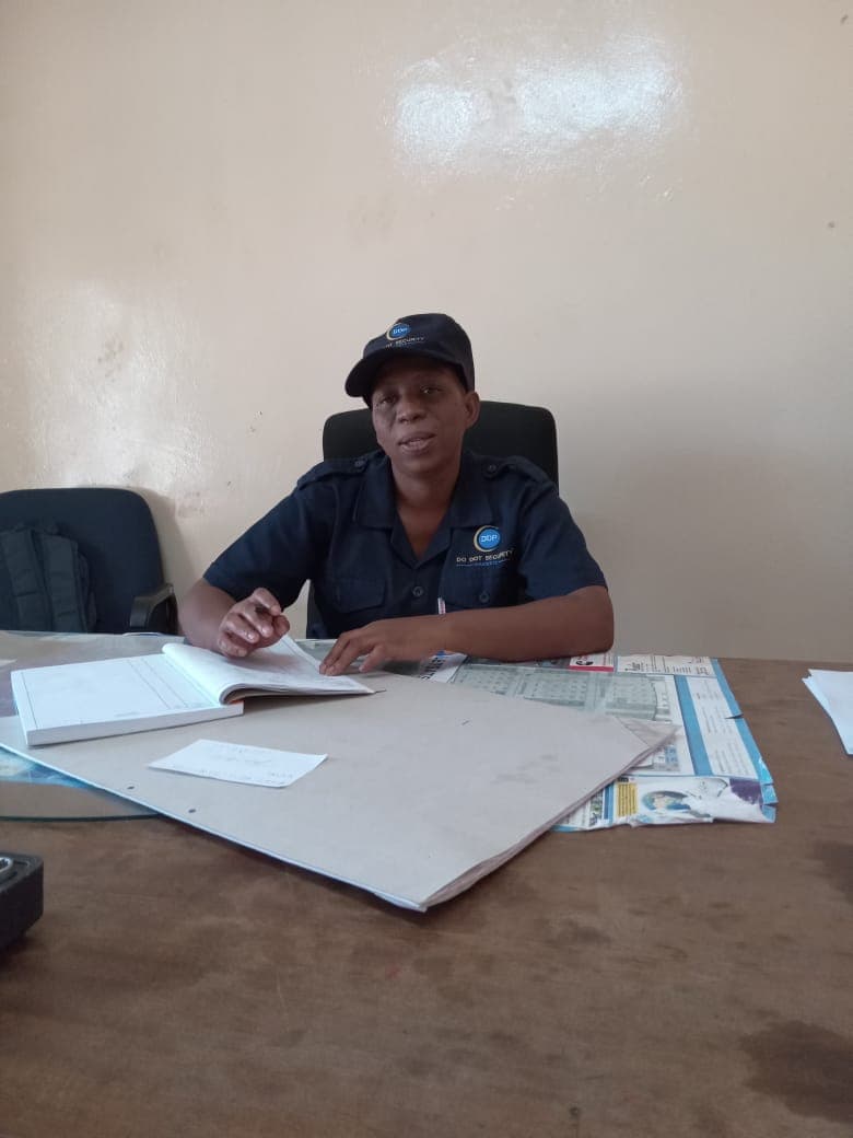 Male officer reviewing files at desk